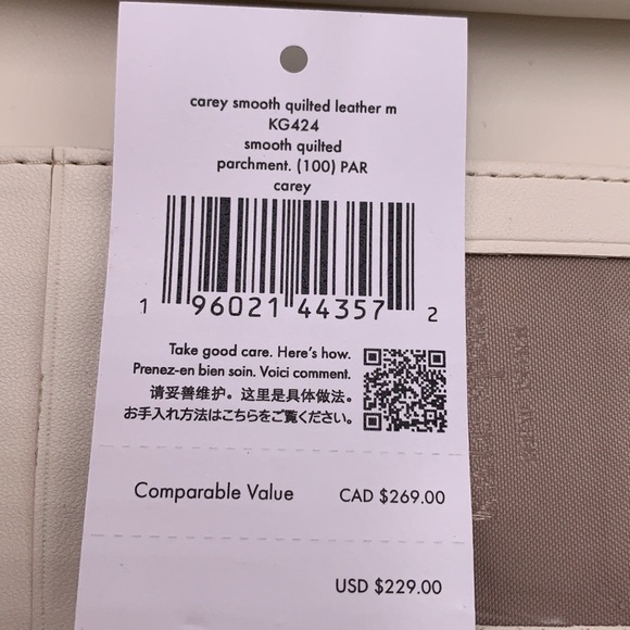 KATE SPADE Carey Medium Compact
Bifold Wallet Parchment Color - Picture 15 of 15